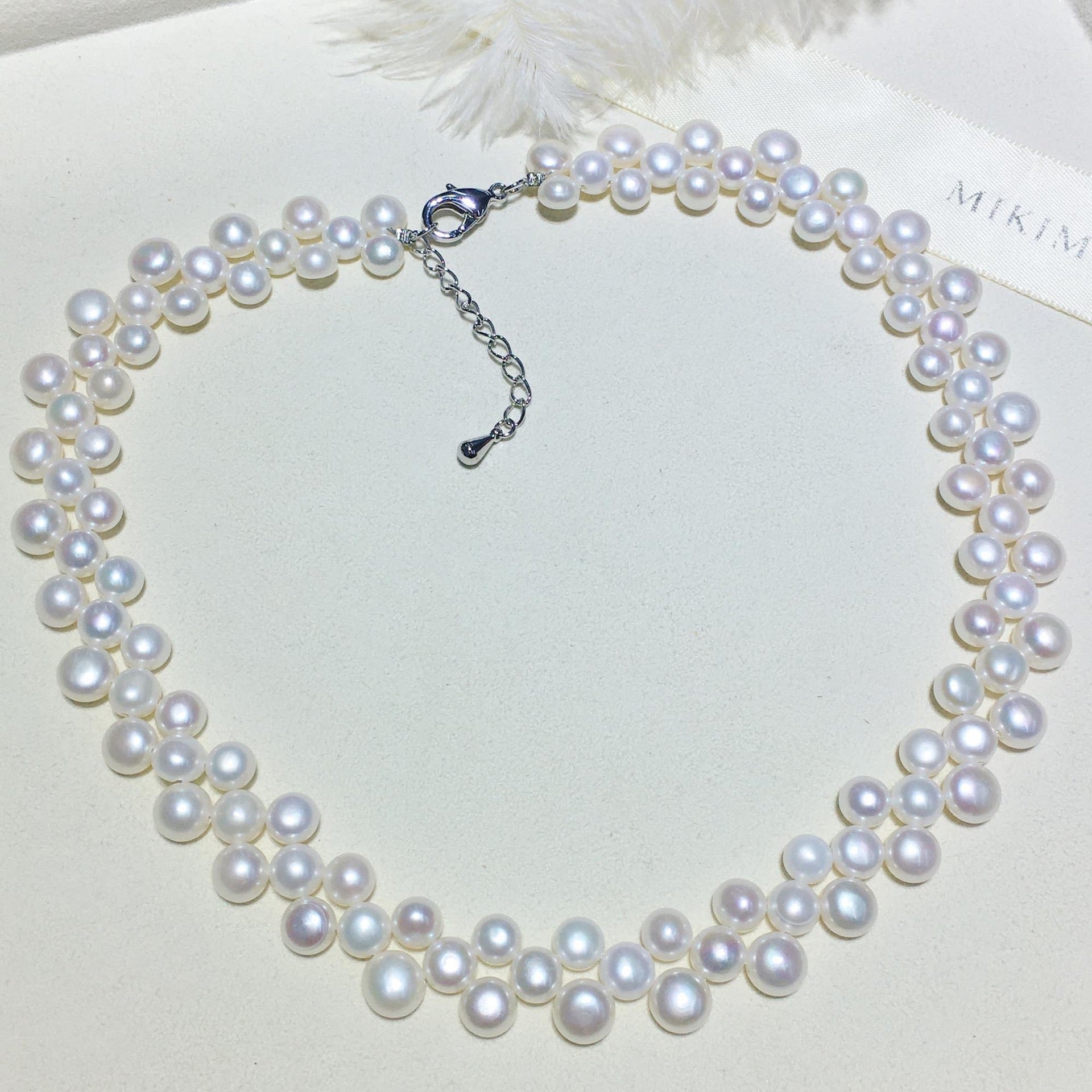 White Triple-Layer Button Pearl Strand Necklace