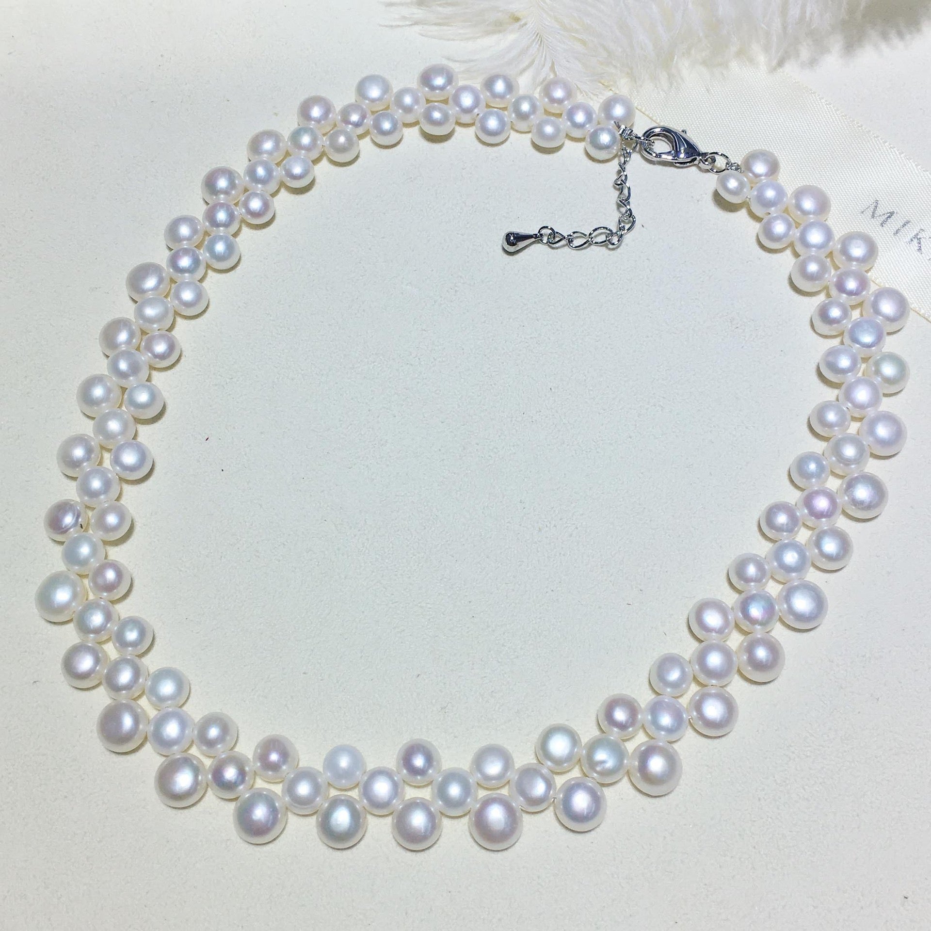 White Triple-Layer Button Pearl Strand Necklace