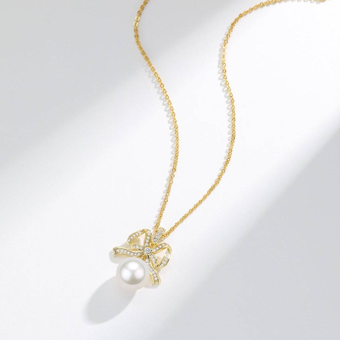 10-11mm Freshwater Pearl CZ Bowknot Pendant Necklace