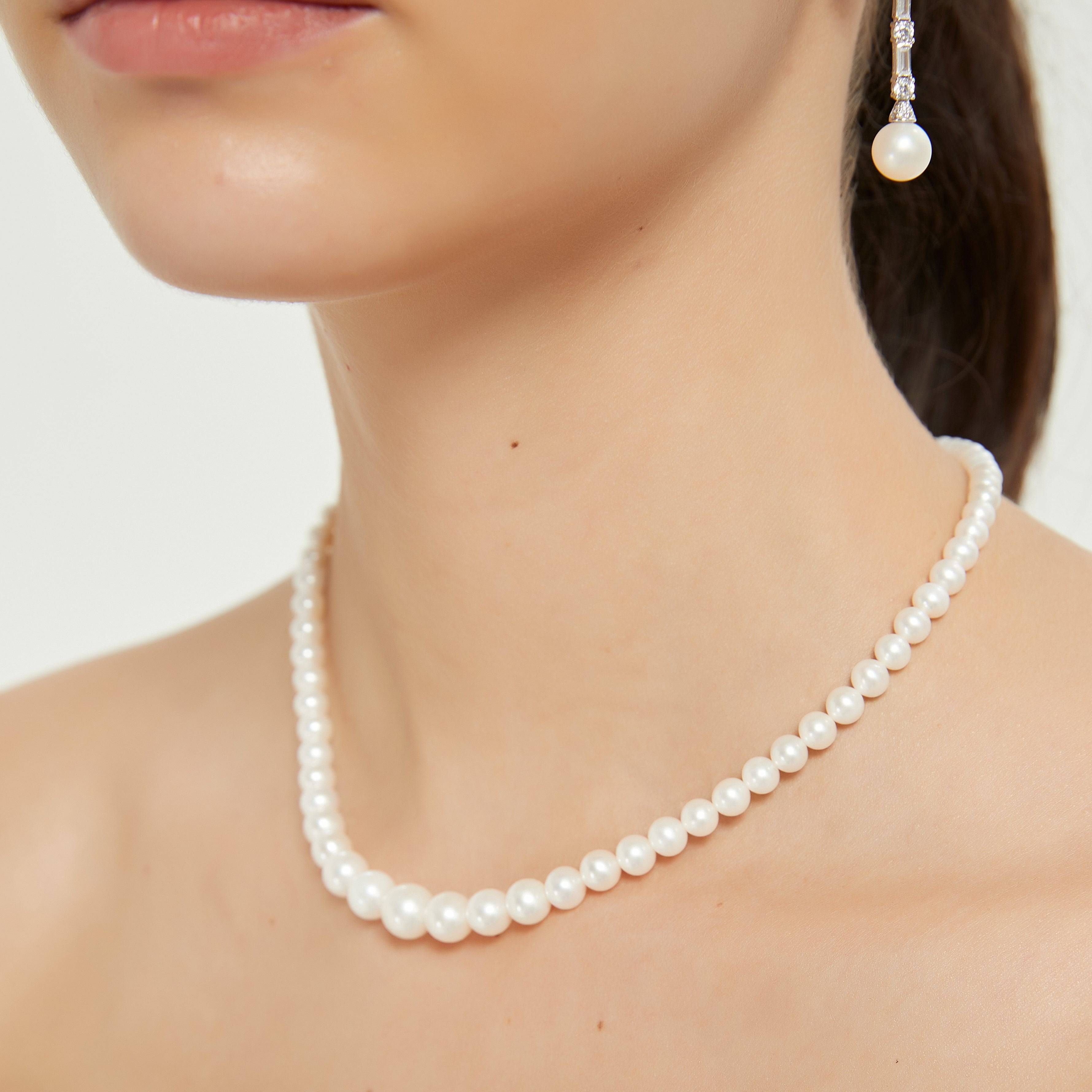 Gradual Size White Freshwater Pearls Strand